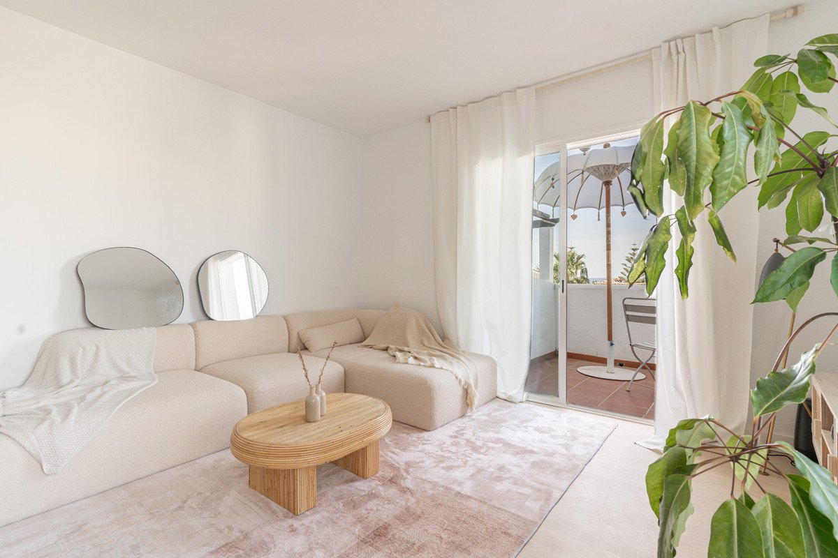Minimalist living area inside a Malaga apartment