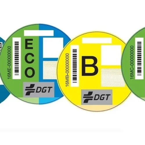 DGT environmental stickers for cars in Spain showing B, C, ECO and Zero Emisiones labels.